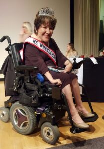 Kathleen Barajas wearing sash and crown winning ms. wheelchair California