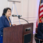 Dolores Huerta at podium giving keynote