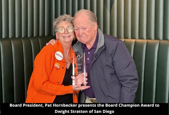 Pat Hornbecker presenting award to Dwight Stratton