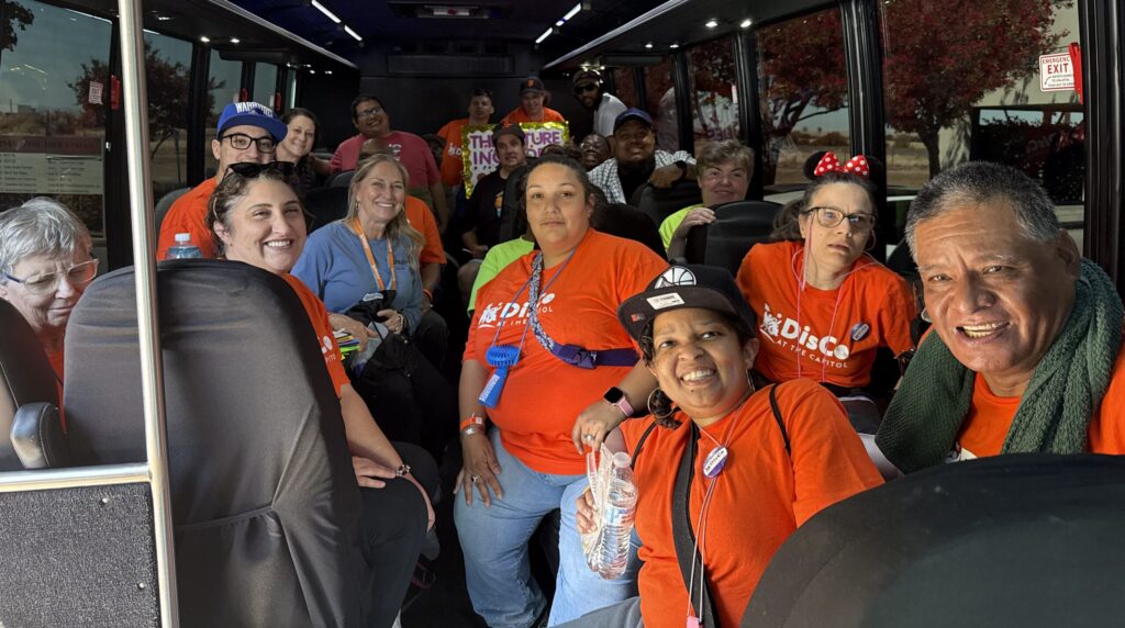 VistAbility participants and staff riding on the bus