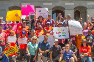 Group photo of VistAbility participants, staff and families on the Capitol steps.
